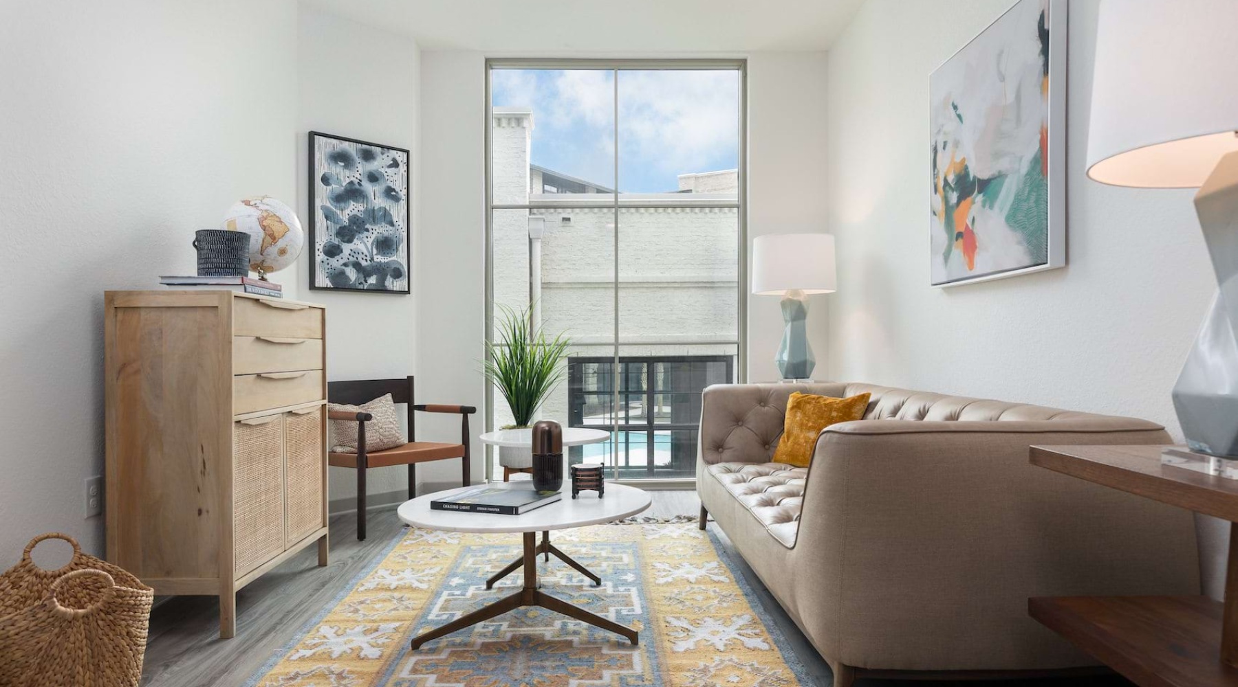 Bright living room with modern finishes at Foundry Point apartments in Charleston South Carolina.